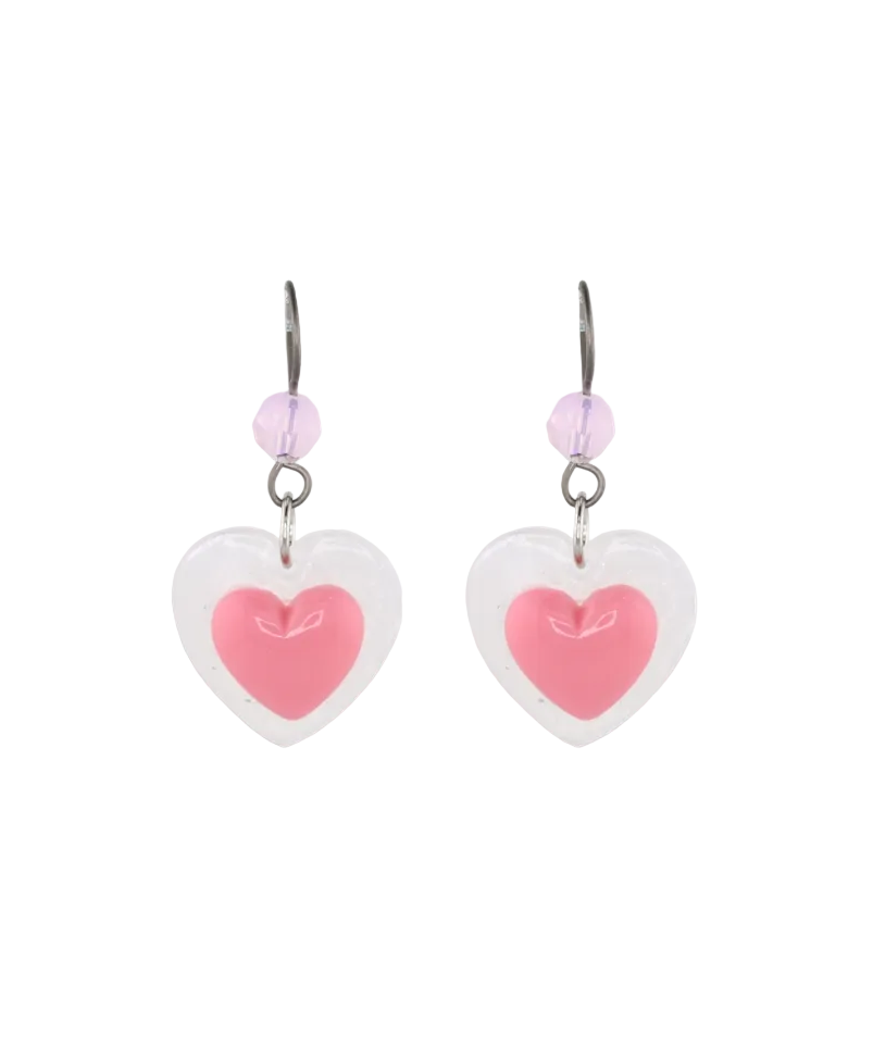 A pair of earrings featuring pink heart-shaped pendants with a white outline and small crystal accents.
